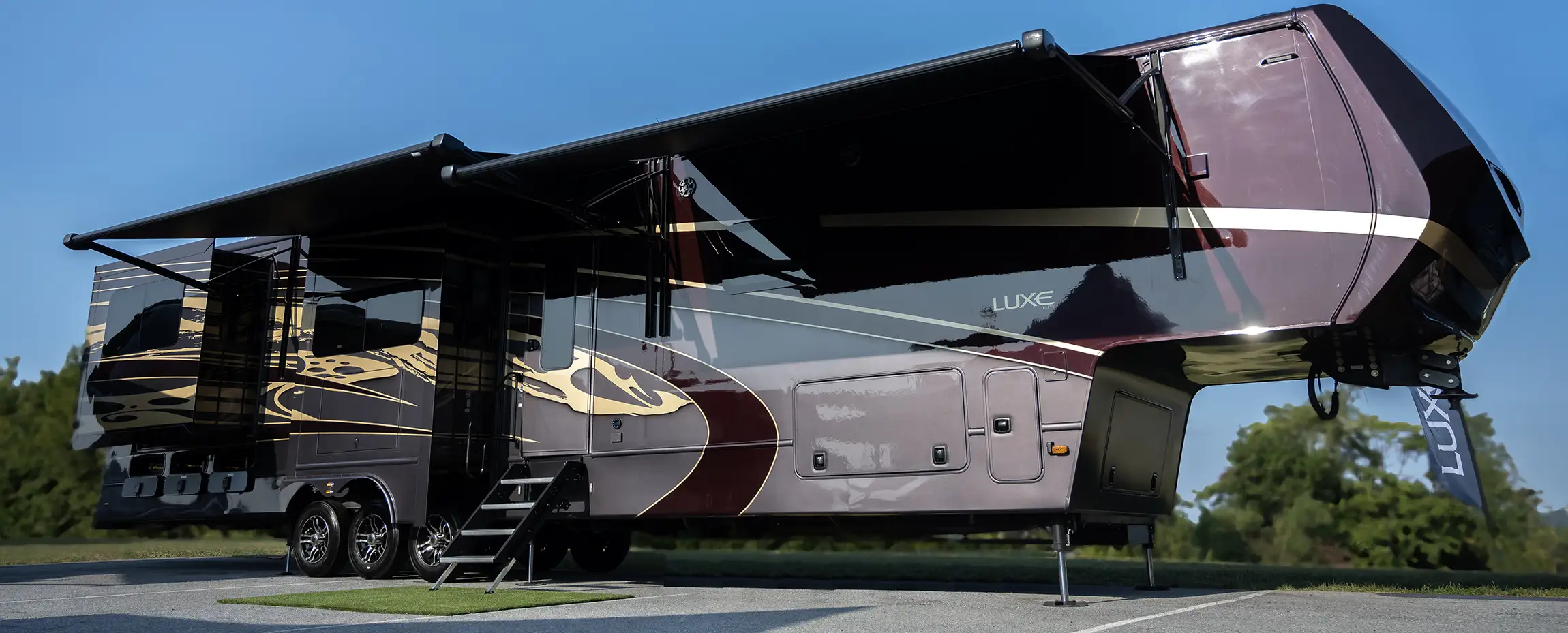 Luxe 2025 Hershey Meet-N-Greet A luxury rear kitchen fifth wheel by Luxe Fifth Wheel.