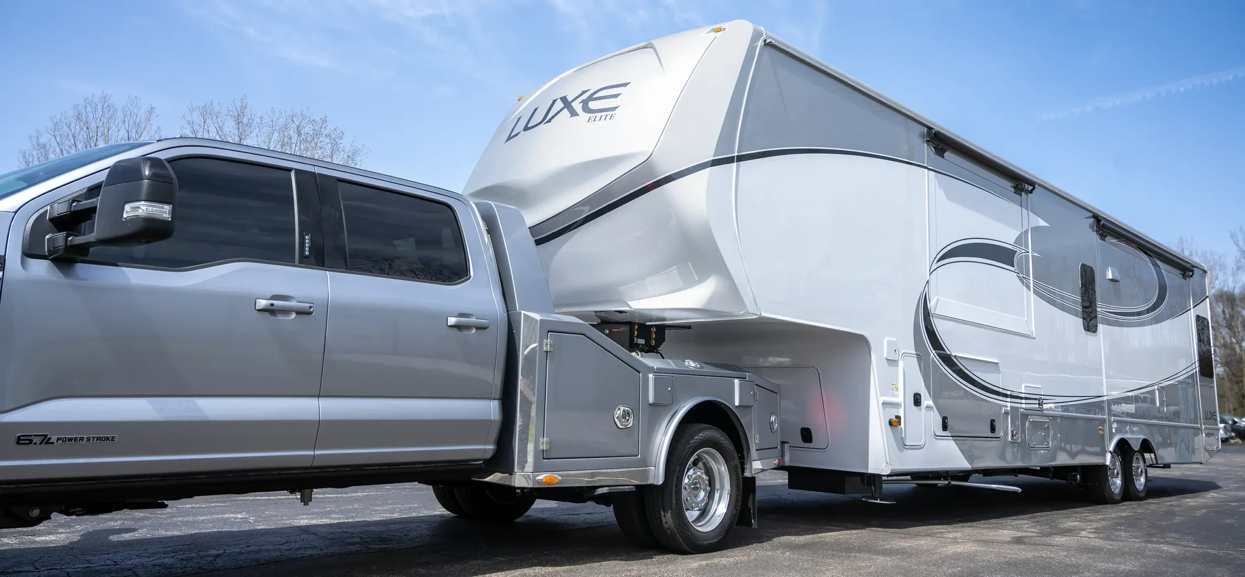 luxe-elite-luxury-fifth-wheel-luxe-truck-2 A Luxe Elite model Luxury Fifth Wheel hauled by a Luxe Truck Fifth Wheel Hauler truck, with a custom all-aluminum hauler bed.