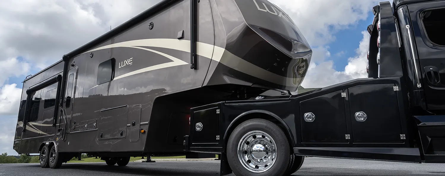 The exterior of a Luxe Gold luxury fifth Wheel, built by Luxe Fifth Wheels out of Elkhart Indiana.